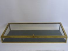 An Ateliers William Paris Table-Top Brass Display Cabinet, approx 95 x 17 cms.