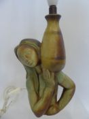A Lladro Lamp Base, depicting a water carrier, approx 34 cms