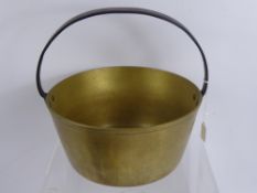 A Brass Jam Pan, with cast iron handle, approx 26 x 13 cms together with two copper plungers. (3)