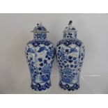 Pair of Chinese Blue and White Vases and Covers, hand painted with chrysanthemum and butterflies,