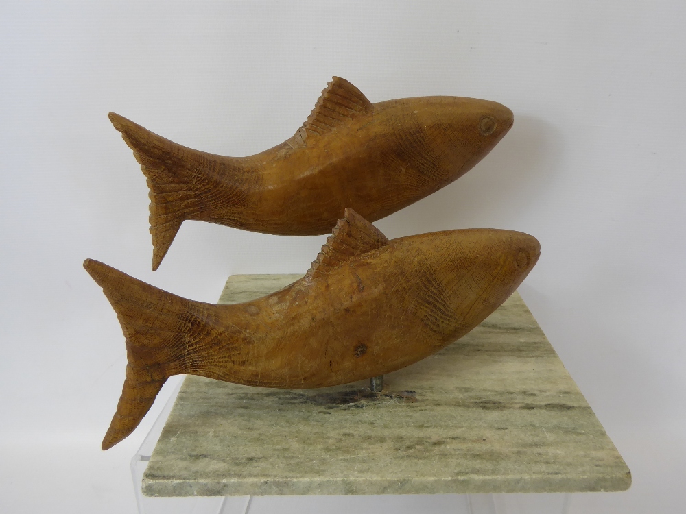 A Wood Carved Fish Sculpture, mounted on a green marble base, approx 30 x 30 x 23 cms