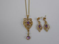 A 9 ct Gold Heart Amethyst and Seed Pearl Pendant, with matching stud earrings.