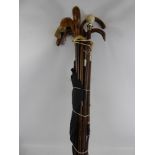 Quantity of Gentleman's Walking Sticks, some with silver collars and a black umbrella.