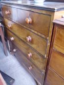 A Mahogany Chest of Drawers, two short and three graduated long drawers, raised on bracket feet,