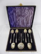 A Set of Six Silver Apostle Tea Spoons, including sugar tongs and sugar sifter.