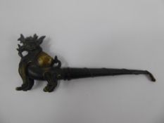 An Antique Bronze Chinese Opium Pipe, in the form of a dragon, approx 20 cms.