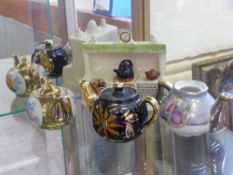 A Miscellaneous Collection of Doll's House Miniature Pottery, mainly tea sets, together with four