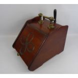 An Edwardian Mahogany and Brass Coal Scuttle, fitted with a ebony handled coal shovel, together with