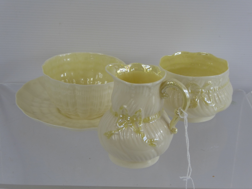 An Irish Belleek Double Shell Pattern Cup and Saucer, with jug and sugar bowl. 5th period 2nd