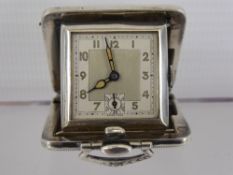 A Lady's Continental Silver Travelling Clock, engine turned engraving stamped 925.