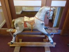 F.H. Ayres, Antique Dapple Grey Rocking Horse, approx head to tail approx 77 cms, hoof to ear approx