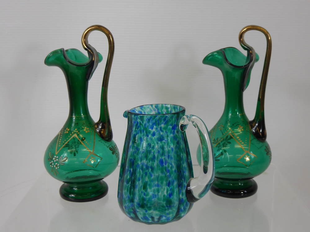 A Pair of Victorian Sea Green Water Decanters, with enamel decoration, together with a green/blue