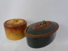 A French Pilvuyt & Co Ceramic Pate Tureen and Cover, together with a circular pot and cover. (2)