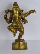 An Indian Gilt Metal Hindu Figure of Ganesh, depicted dancing, approx 16 cms