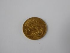 A Solid Gold George V Full Sovereign, dated 1913, approx 8.2 gms.