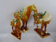 Two Tang Horses, together with a camel.