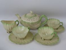 A Late 19th Century Irish Belleek Tea Set, second black factory mark, comprising four saucers, three