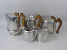 A Chrome Seven Piece 'Picquet Ware' Tea and Coffee Set,. comprising coffee, tea and hot water