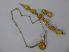 A Silver and Butterscotch Amber Necklace Set, including necklace, bracelet and clip earrings,