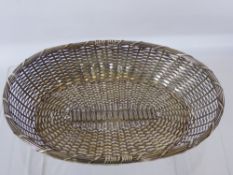 A White Metal Oval Wire-Work Bread Basket, approx 19 x 27 cms