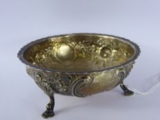 A Silver Victorian Bowl, London hallmark dd 1881, mm WTWC, the bowl having repoussé floral