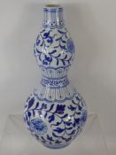 A Taiwanese 20th Century Blue and White Double Gourd Vase, approx 37 cms