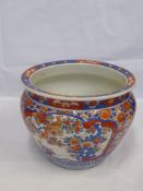 A Late 19th Century Japanese Imari Fish Bowl, with stylized flower heads interspersed by pictorial