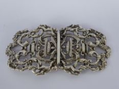 A Circa 1899 Silver Nurse's Buckle, decorated with cherubs, mm WH, approx 66 gms