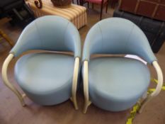 A Pair of French 'Souvignet' Leatherette Foyer Chairs, covered in pale blue leatherette with cream