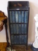 Complete Volume of Charles Dickens Novels, housed in a mahogany three-tiered stand.