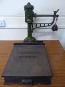 Green Cast-Iron Henry Pooley & Son Scale, with a quantity of weights.