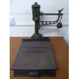 Green Cast-Iron Henry Pooley & Son Scale, with a quantity of weights.