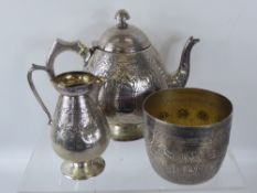 A Victorian Silver Zodiac Pattern Tea Set, comprising tea pot, milk jug and gilded bowl, Ediburgh