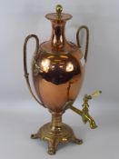 A Regency Copper and Brass Samovar, pourer with ivory handle, in the form of an urn with arched