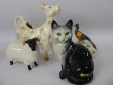 A Collection of Beswick Porcelain, including a kitten, creamer, pheasant ashtray and a black faced