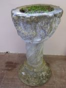 An Antique Stone Planter, fixed to a composite stone plant stand, approx 80 cms h