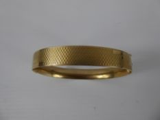 A Lady's 9ct Gold Metal Core Bracelet.