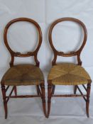 Two Victorian Rattan Seated Bedroom Chairs, the chairs having carving to back and turned