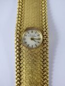 A Lady's 18 ct Gold Girard Perrigaux Cocktail Wrist Watch, the watch having a leaf design bracelet