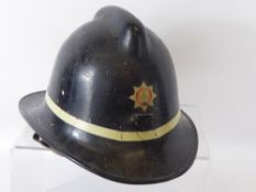 A Vintage Leading-Fireman's Helmet, Gloucestershire Fire Service.