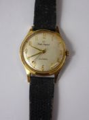 A Gentleman's Smith's Imperial Vintage Wrist Watch, with gold numerals, white face with Roman