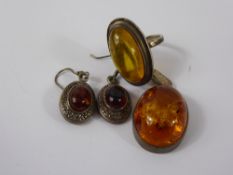 A Lady's Silver and Amber Jewellery, including ring, pendant and earrings, approx 20 gms.