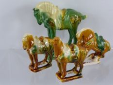 A Miscellaneous Collection of Five Miniature Tang Horses, in green and ochre glaze.