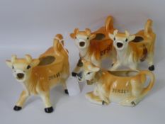 A Collection of Seven Porcelain Creamers, including Tony Wood, Staffordshire England, five "Jerseys"