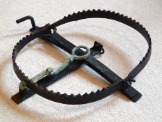 An Antique Iron Gamekeepers Trap,