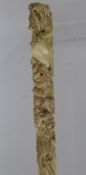 An Antique Carved Ivory Parasol Handle, finely carved with four lions, approx 21 cms. (af)