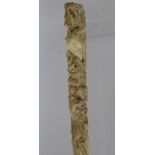 An Antique Carved Ivory Parasol Handle, finely carved with four lions, approx 21 cms. (af)