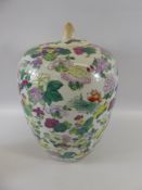 A Chinese 20th Century Famille Rose Style Ginger Jar and Cover, approx 30 cms