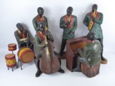 A 20th Century Composite Jazz Group, including double bass, saxophonist, drummer, trumper, pianist