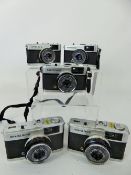 5 x Olympus Trip, (1 af, red flag stuck), (tested) Cameras.